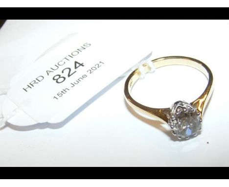 An oval diamond solitaire ring in 18ct setting - Champagne colour - approx 1ct