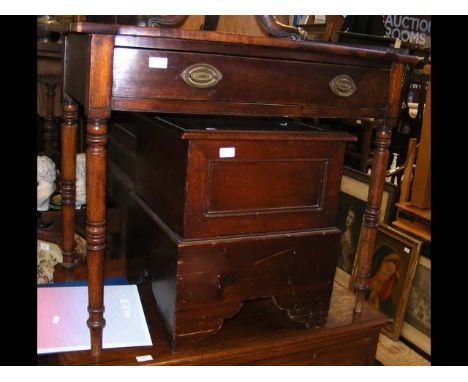 A commode, together with a side table on turned supports 