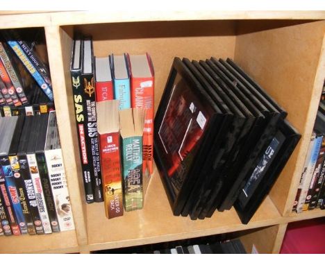 A set of framed film cells including The Godfather and Lord of the Rings together with assorted books