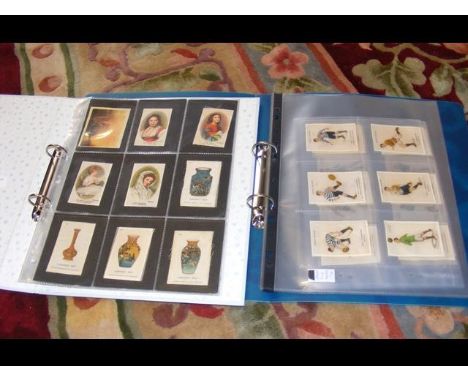 An album of vintage BDV cigarette football silks - circa 1914, together with an album of vintage silks of ceramic art and mot