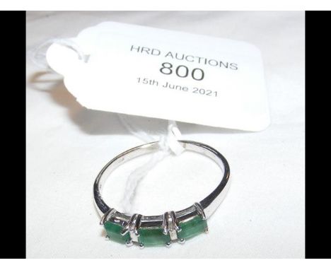 An emerald ring in 9ct white gold settingCONDITION REPORTRing size Z 1/2