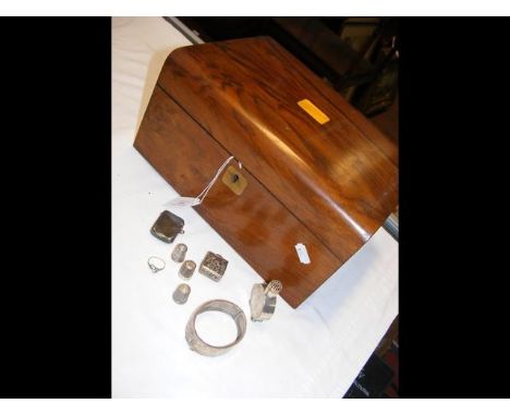 A walnut jewellery box together with silver bangle, vesta case, thimbles etc