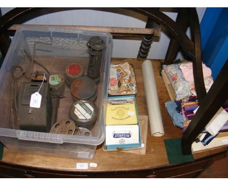 A vintage film projector and reels, together with an assortment of stamps, cigarette cards and material, etc. 