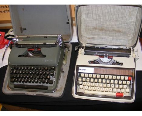 A vintage Olympia typewriter in case and one other