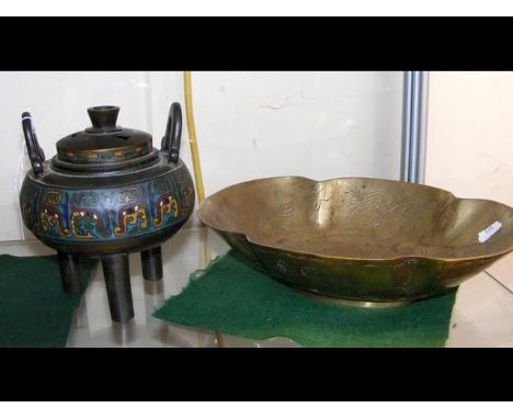 A Chinese bronze censor with Greek key decoration together with a decorative brass tray with wavy edge