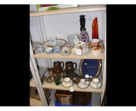 Assorted collectables, including unusual Mintons cups and saucers, silver trophy - on two shelves