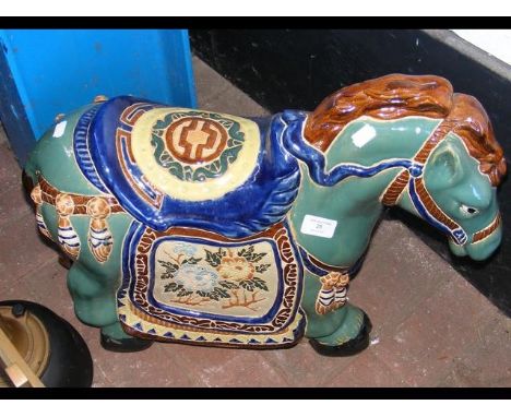 A 46cm high glazed pottery garden horse ornament 