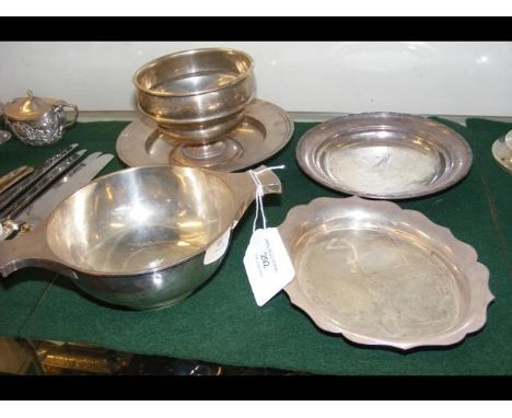 A two handled silver bowl together with one other and three silver pin dishes