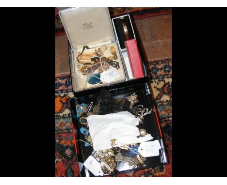 A selection of costume jewellery including bangle, rings etc