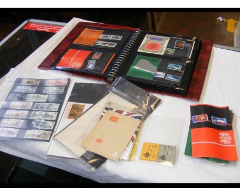 An album bearing GB presentation packs together with booklets, First day covers