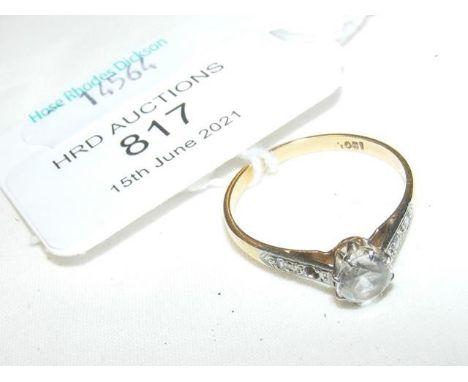 A diamond solitaire ring in 18ct setting