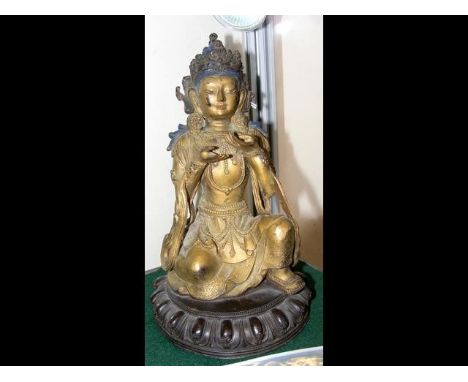 An 18th century buddha with gilt finish seated on bronze seat - 22cms highCONDITION REPORTBy our judgement, condition of lot 