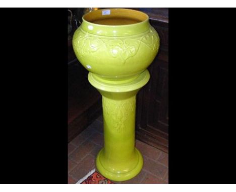 An antique ceramic jardiniere on stand  