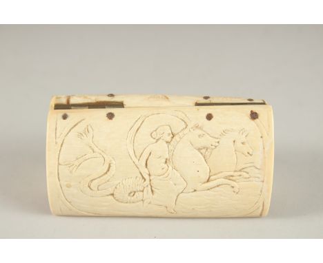 A CARVED BONE SNUFF BOX. 9cms long.