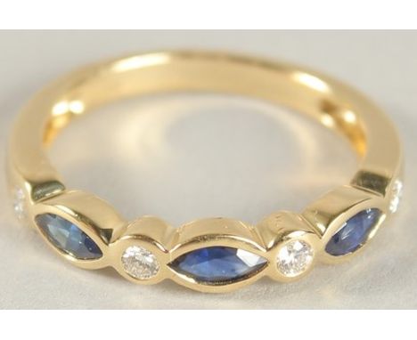 AN 18CT YELLOW GOLD, SAPPHIRE AND DIAMOND HALF HOOP ETERNITY RING.
