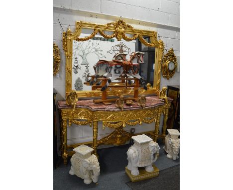 A GOOD LARGE LOUIS XVITH GILTWOOD MARBLE TOP CONSOLE AND MIRROR with garlands and rose swags. 6ft 8ins long x 7ft 6ins high.