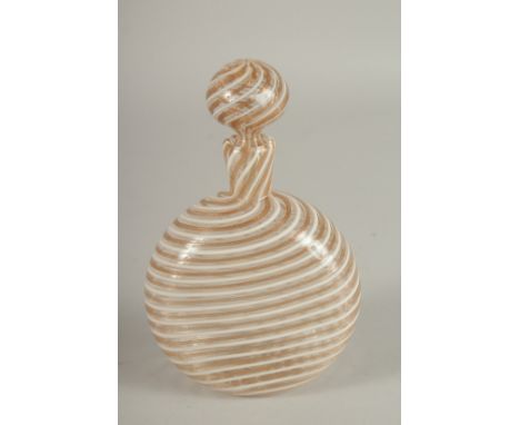 A VENINI GLASS FLASK WITH STOPPER, decorated with swirling bands of gold and opaque white. 15cms high.