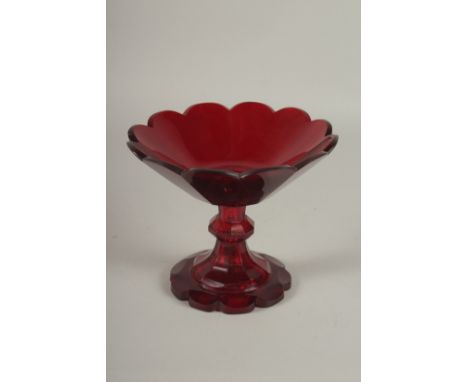 A CUT GLASS RUBY TINTED TAZZA. 18cms diameter.