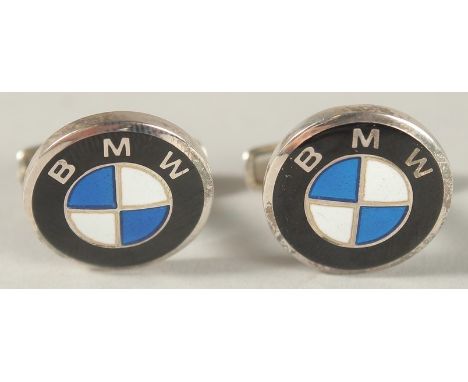 A PAIR OF STERLING SILVER AND ENAMEL BMW EMBLEM CUFFLINKS.