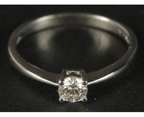 A 9CT WHITE GOLD RBC DIAMOND SOLITAIRE RING, boxed. Diamond 0.25ct.