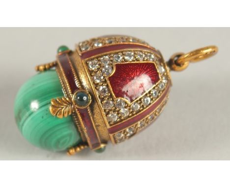 A SILVER, BLUE ENAMEL AND MALACHITE EGG PENDANT.