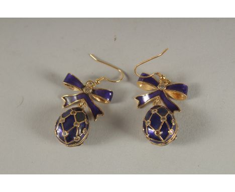 A PAIR OF RUSSIAN BLUE ENAMEL EGG SHAPED EARRINGS.