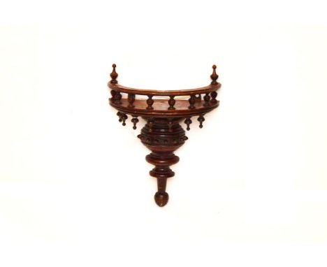 A Small Mahogany Wall Bracket