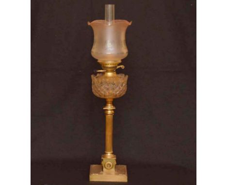 A Brass Pillar Oil Lamp and Shade