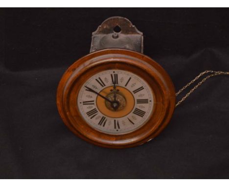 A Postman’s Wag at the Wall Alarm Clock