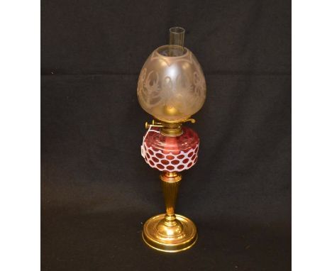 An Oil Lamp, Ruby Coloured Bowl, Decorated Shade