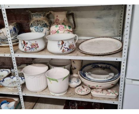 2 SHELVES OF VINTAGE CHINAWARE INCL; A LARGE MEAT PLATE BY WOOD &amp; SONS, CHAMBER POTS - 1 MISSING HANDLE, WASH BOWLS &amp;