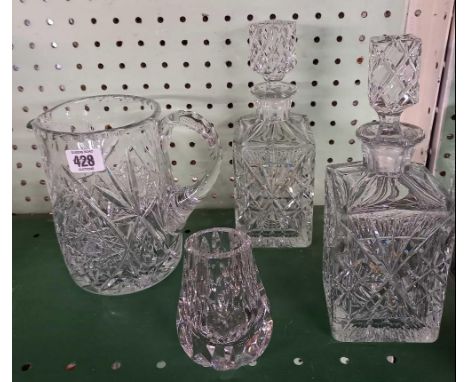 SHELF OF CRYSTAL GLASSWARE WITH PAIR OF DECANTERS &amp; 1 OTHER, WATER JUG, FRUIT BOWL ETC