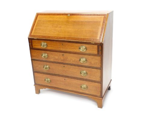 An early 19thC oak and mahogany cross banded bureau, the fall enclosing a fitted interior above four graduated drawers, each 