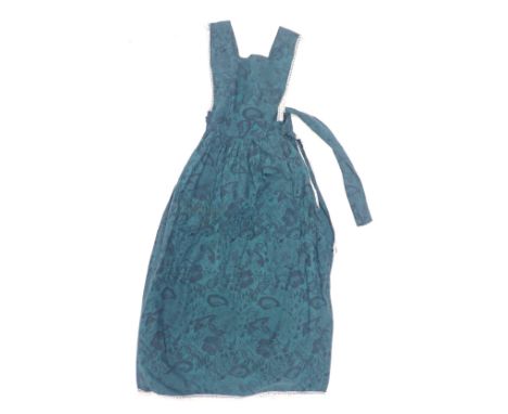 A lady's early 1970s Laura Ashley vintage green patterned dress.