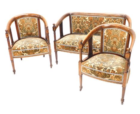 An Edwardian stained beech and boxwood strung salon suite, comprising two seat sofa and two tub shaped chair, each with a pad