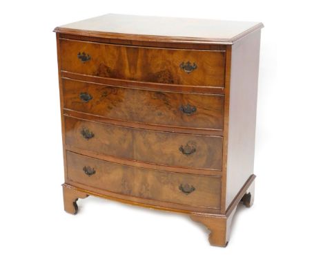 A walnut and figured walnut bow fronted chest, the top with a moulded edge above four drawers with drop handles, on bracket f