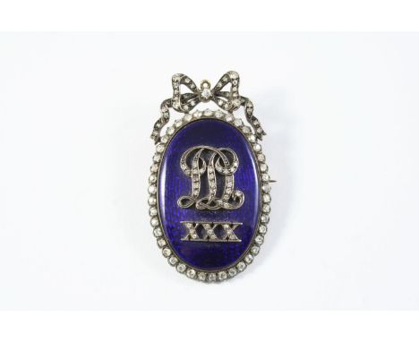 A GEORGIAN DIAMOND AND BLUE ENAMEL BROOCH the blue enamel centre with embossed diamond set initial decoration, set within a b