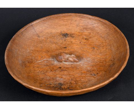 ROBERT THOMPSON OF KILBURN - MOUSEMAN BOWL an oak adzed circular fruit bowl, with a carved mouse to the centre. 29cms diamete