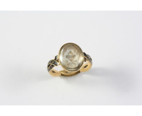 A GEORGE III SEPIA AND BLACK ENAMEL MOURNING RING the centre section depicting an urn under a tree, the double interwoven sha
