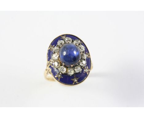 A SAPPHIRE, DIAMOND AND ENAMEL CLUSTER RING the oval-shaped cabochon sapphire is set within a surround of cushion-shaped diam