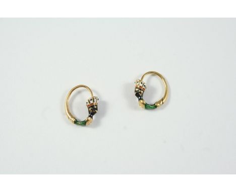 A PAIR OF 19TH CENTURY BLACKAMOOR HOOP EARRINGS decorated with white, black and green enamel, in gold