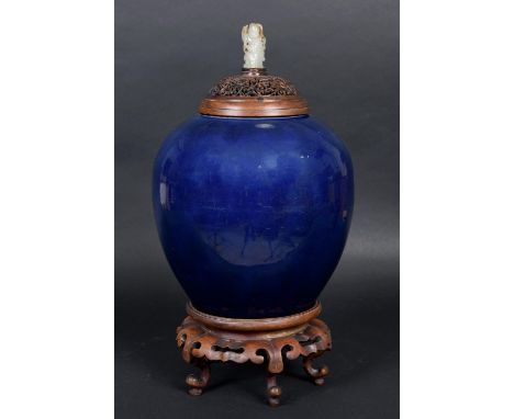 19THC CHINESE PORCELAIN JAR &amp; COVER a large jar with a dark blue glaze and brown stained rim, with a pierced hard wood wo