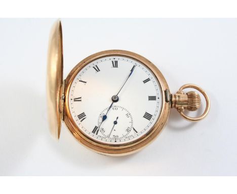 A 9CT GOLD HALF HUNTING CASED POCKET WATCH the white enamel dial with Roman numerals and subsidiary seconds dial, 50mm dia., 