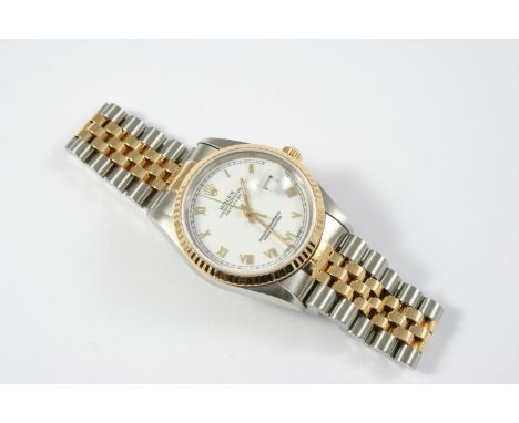 A GENTLEMAN'S STAINLESS STEEL AND GOLD OYSTER PERPETUAL DATEJUST WRISTWATCH BY ROLEX the signed white dial with Roman numeral