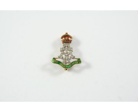 A DIAMOND AND ENAMEL REGIMENTAL BROOCH FOR THE GREEN HOWARDS mounted with single-cut diamonds and cabochon rubies and emerald