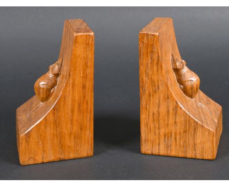 ROBERT THOMPSON OF KILBURN - PAIR OF MOUSEMAN BOOKENDS a pair of oak adzed bookends, both carved with the mouse on each end. 