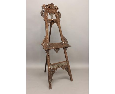 MOORISH ARTIST EASEL early 20thc, a hardwood easel with carved and inlaid decoration and bobbin turned panels, with a picture