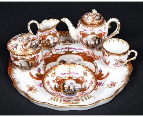 DRESDEN BREAKFAST SET decorated in the Meissen style, comprising a a circular lobed tray (28cms dia), teapot (11cms high), li