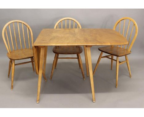 ERCOL DINING ROOM SUITE comprising a light elm sideboard with a two door cupboard, and a single cupboard with cutlery drawer.