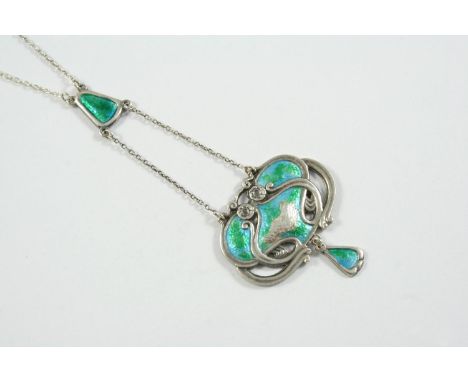AN ENAMEL AND SILVER PENDANT BY CHARLES HORNER with blue and green enamel decoration, maker's mark, hallmarked for Chester 19